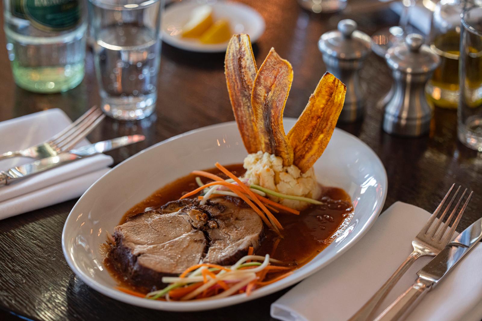 spicy roasted pork with plantain chips